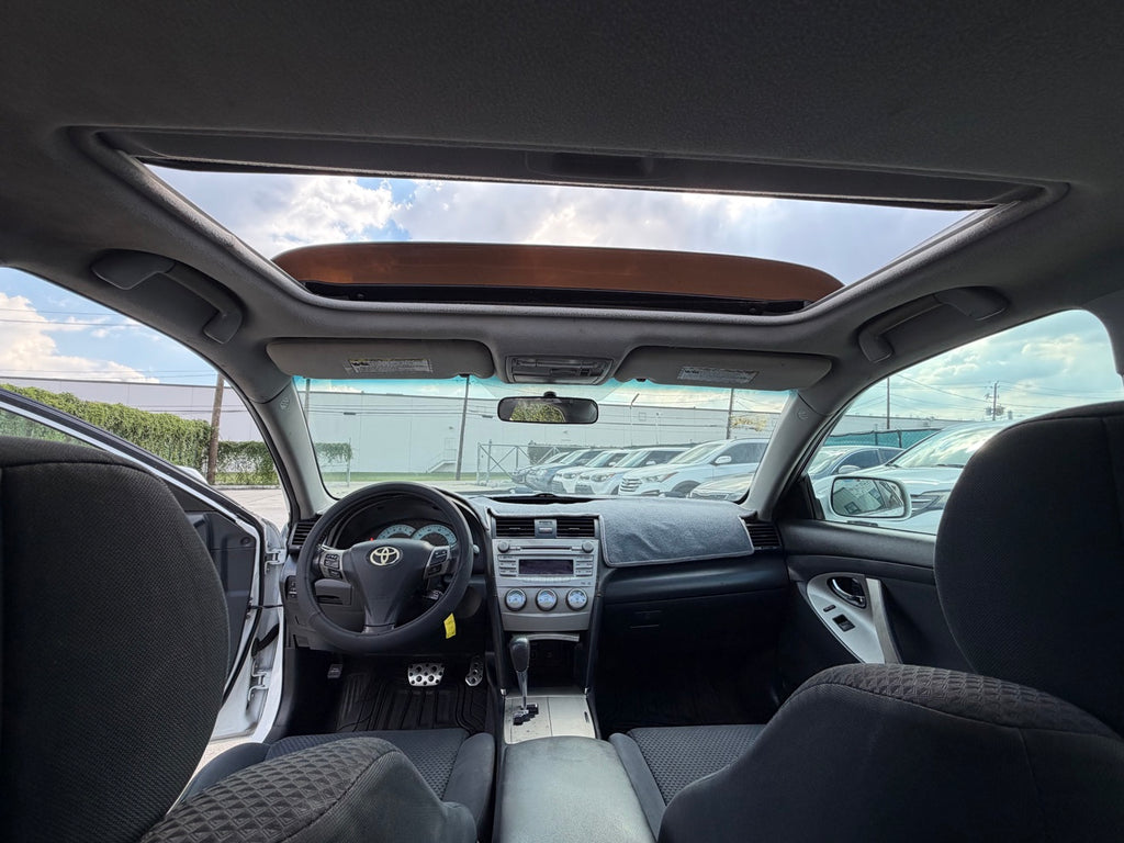 2011 Toyota Camry SE interior with sunroof
