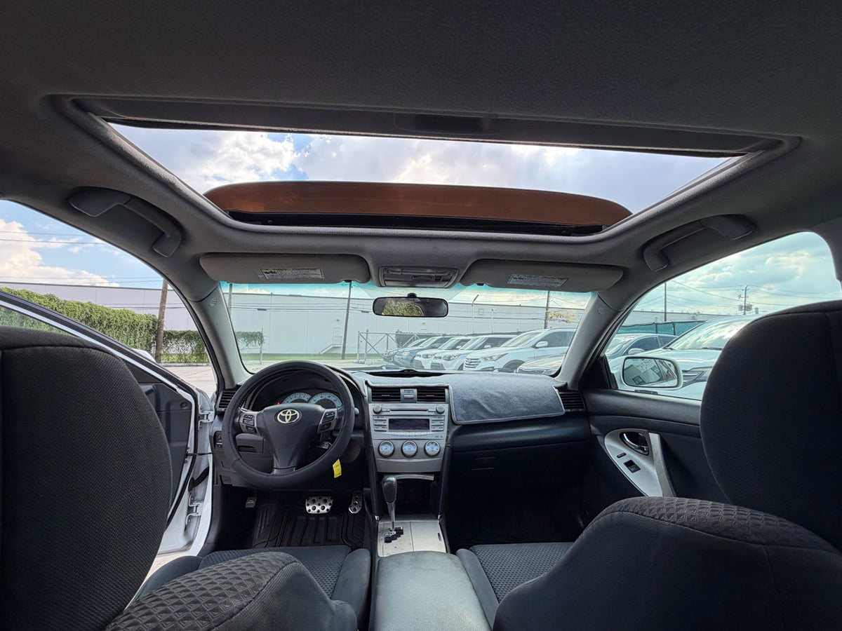 2011 Toyota Camry SE interior with sunroof